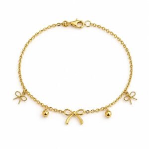 Bracelet à breloques ruban et boules d’or 18k, 19cm, 2.58g