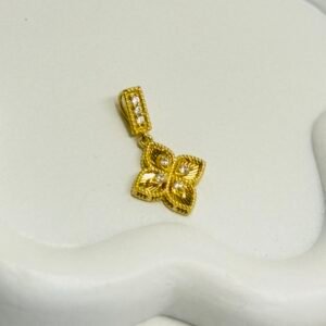 Pendentif fleur 18k petit format 1.52g