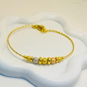 Bracelet flexible d’or 18k tricolore , 4.45g ajustable