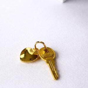 Pendentif clé et cœur d’or 18k, 2.07g